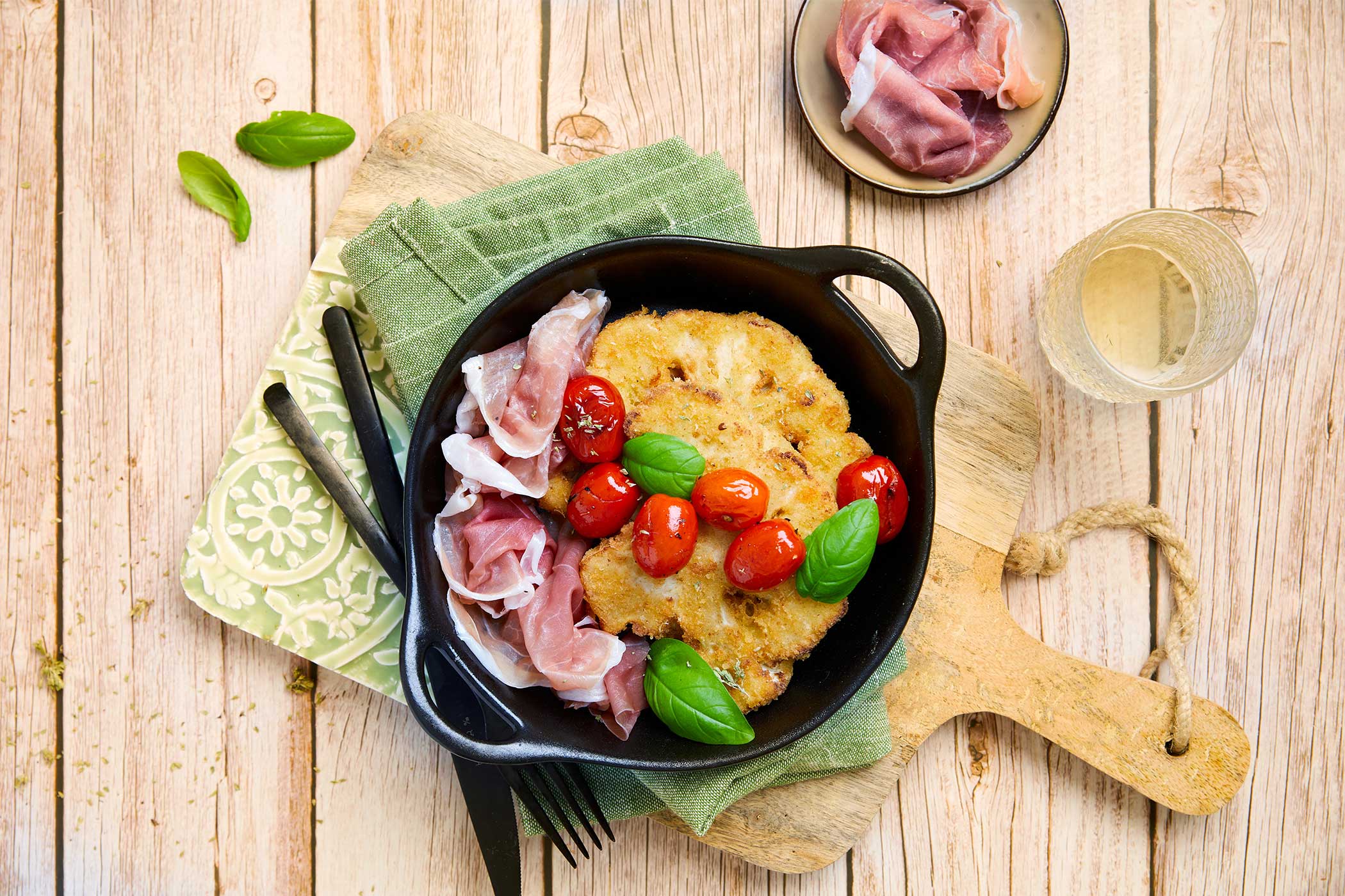 Cavolfiori in crosta di parmigiano con Prosciutto di San Daniele e pomodori arrosto