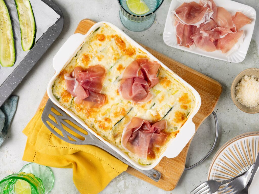 Parmigiana bianca di zucchine con Prosciutto di San Daniele