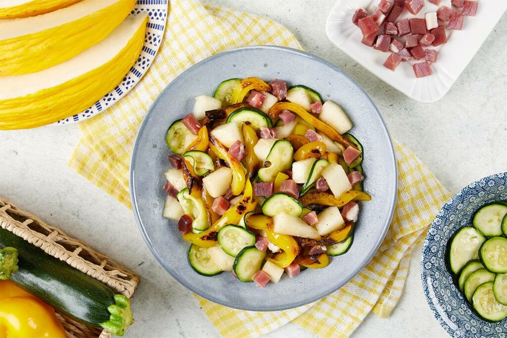 Insalata di melone con dadolata di Prosciutto di San Daniele e peperone grigliato