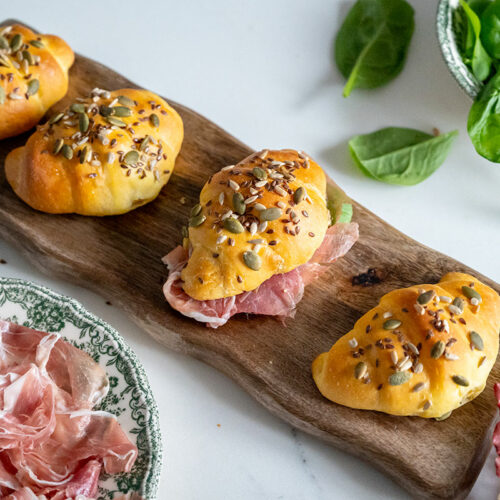 Cornetti alla zucca ripieni di Prosciutto di San Daniele, caprino e porcini trifolati